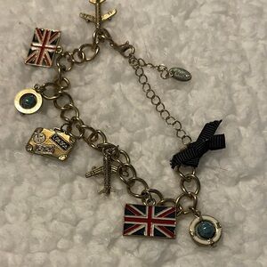 Chic Gold Charm Bracelet with Union Jack and Black Bow